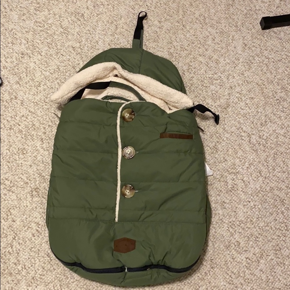 This is a car seat cover for the winter